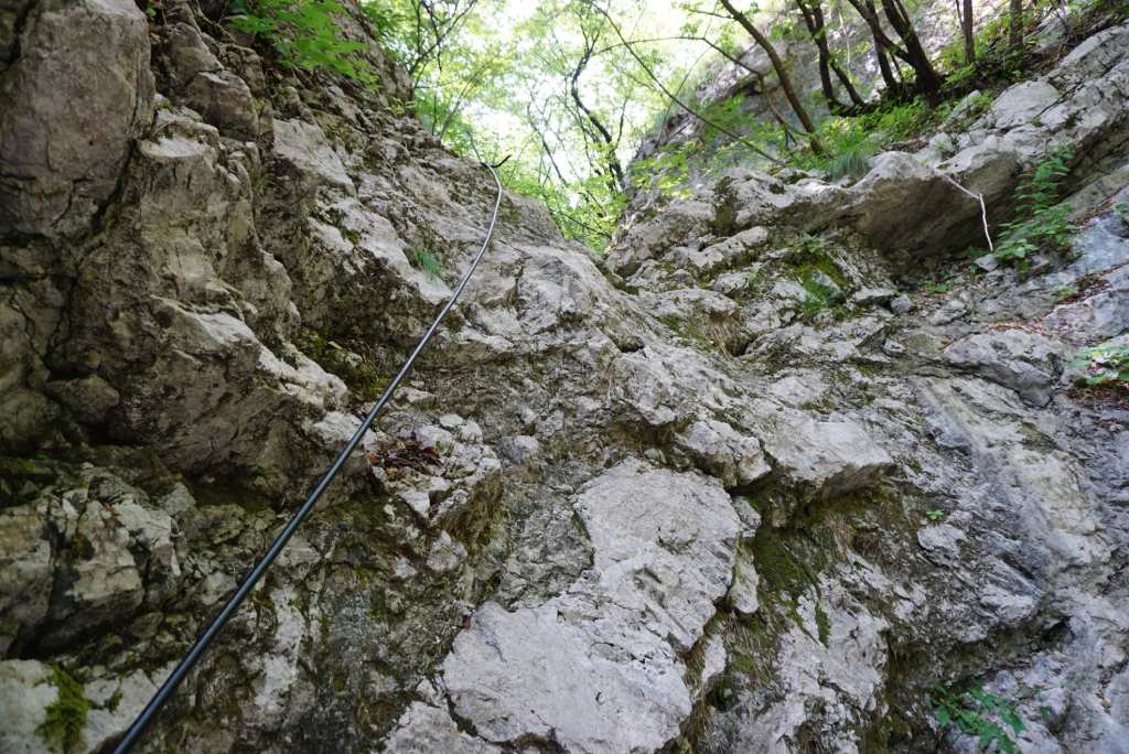 Exploring the Grobnik Alps: a gentle hike through Mudna Dol Canyon, past rocky peaks to tranquil lakes 