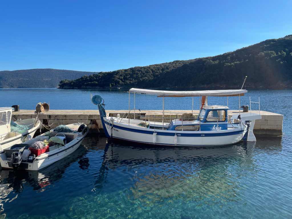 Cres, Slow Things to Do, a boaut in Valun. Photo credit R. Zdravko