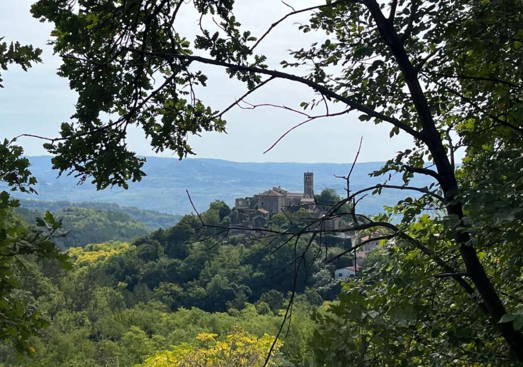 Završje, seen from above — a quiet view over the place, where the landscape opens gently beneath you. Photo credit Zdravko R.